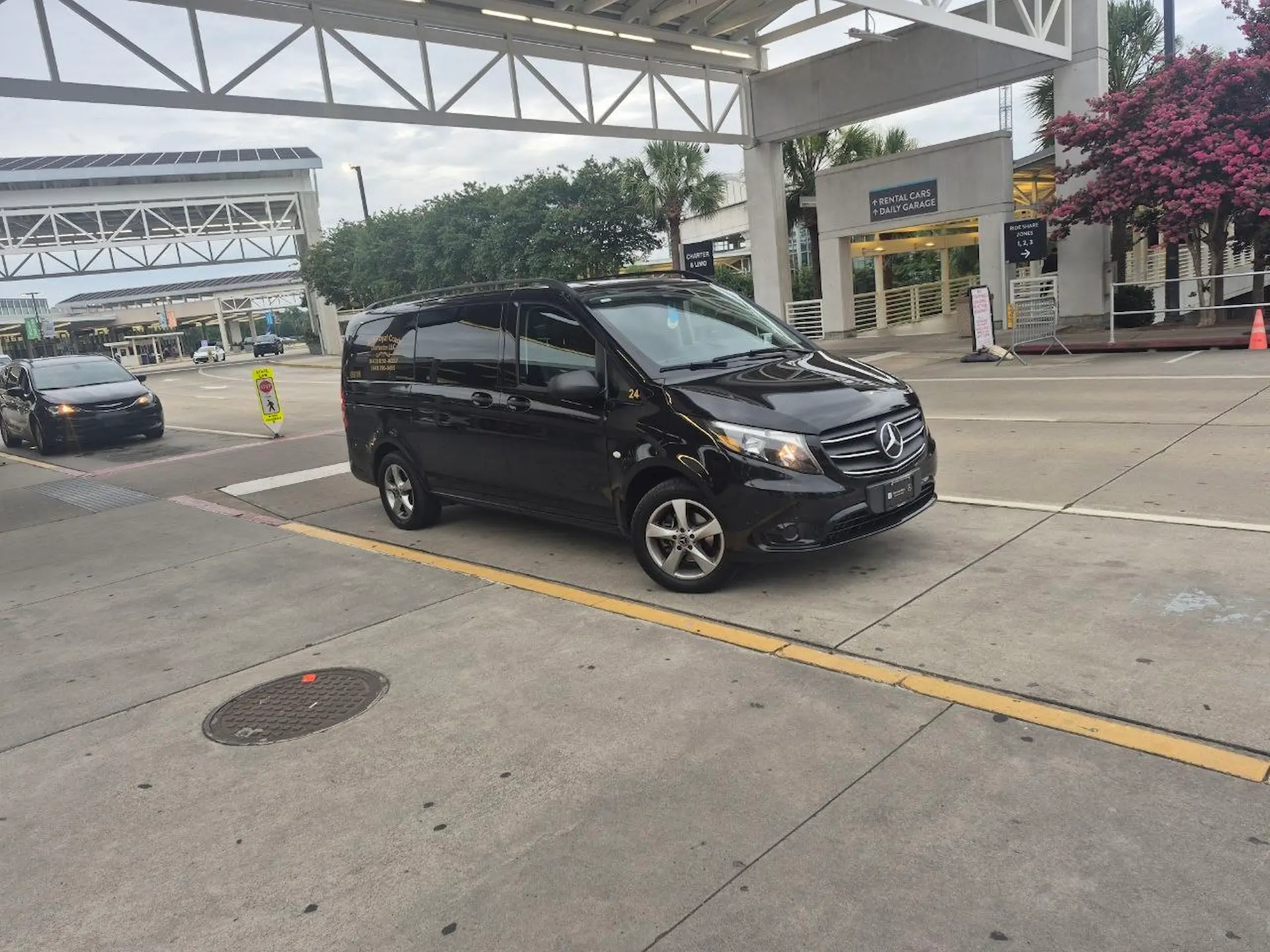 Black Mercedes-Benz Metris passenger van wedding transportation Charleston SC